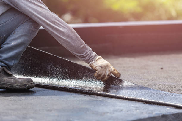 Professional Basement Waterproofing technician working in Olcott, NY